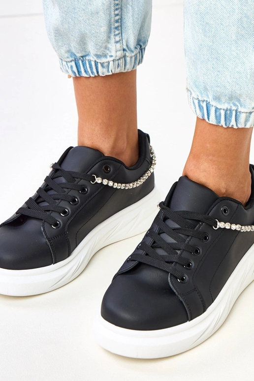 Mustad platvormi tossud dekoratiivse... Mustad platvormi tossud dekoratiivse...