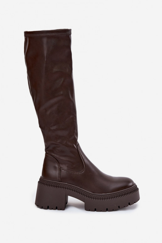 Naiste pikad saapad massiivsete kontsade ja platvormiga slip-on mudel pruuni värvi Florinne Naiste pikad saapad massiivsete kontsade ja platvormiga slip-on mudel pruuni värvi Florinne