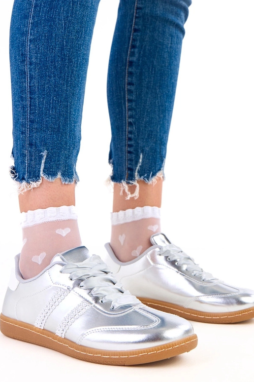 Hõbedased naiste spordijalatsid...