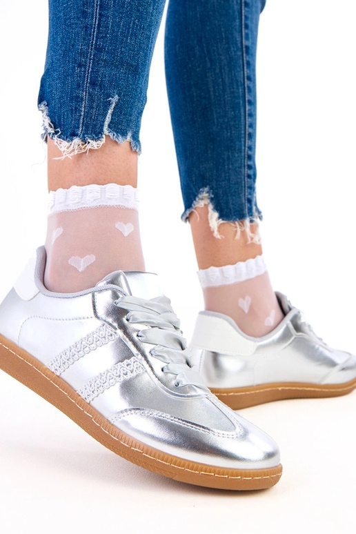 Hõbedased naiste spordijalatsid...