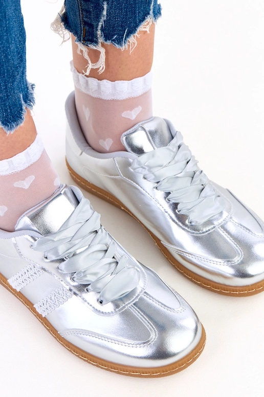 Hõbedased naiste spordijalatsid...