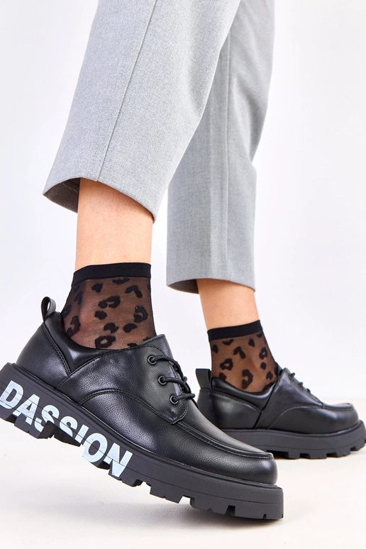 Mustad naiste poolsaapad mustriga Klowis