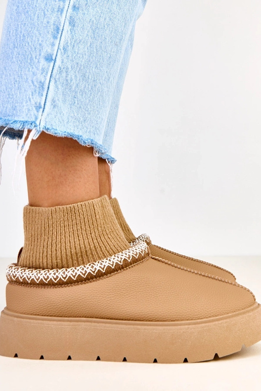 Pruunid lume saapad sokki kujulise...