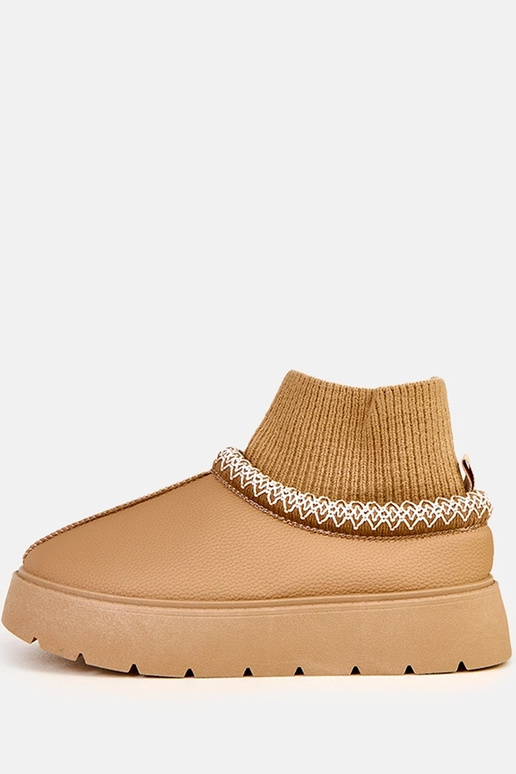 Pruunid lume saapad sokki kujulise...