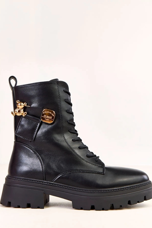 Mustad naiste matkasaapad kullast...