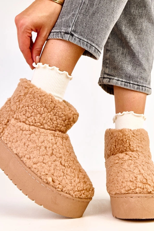 Lasso heledat pruunid lumebootsid...