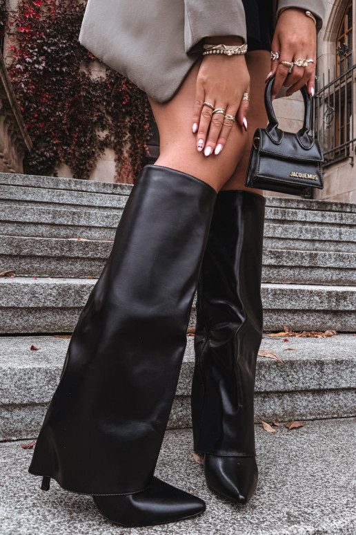 Soojad pikad saapad õhukeste kontsade ja sisse lõigatud sääreosaga mustas värvitoonis Tamonia