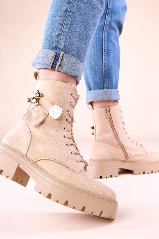 Beežid naiste traperid kuldse karuga...