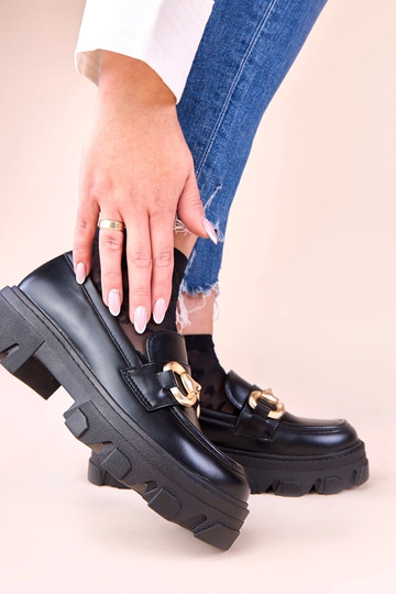 Mustad mokasiinid kuldse...