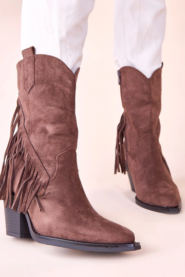 Pruunid cowboy kingad pomponidega Elama