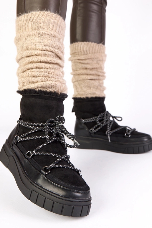 Must soe nööpidega lume saapad...