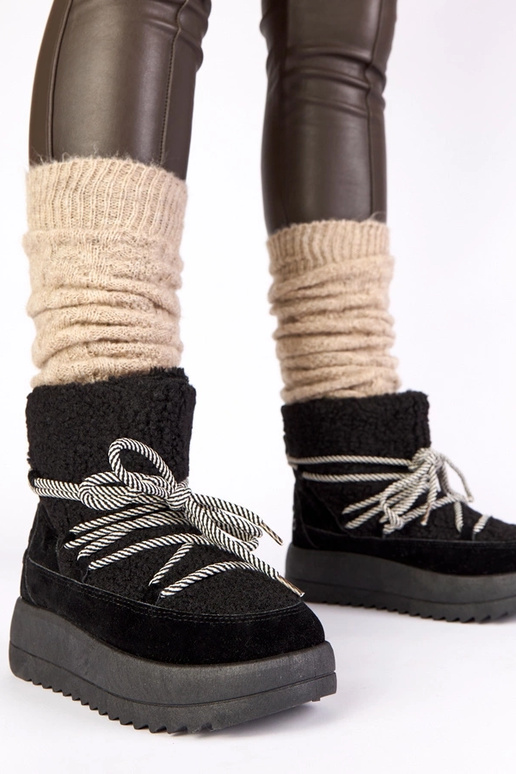 Must soe nööpidega lume saapad...