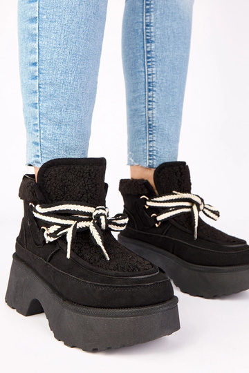 Musta lumesaapad sooja...