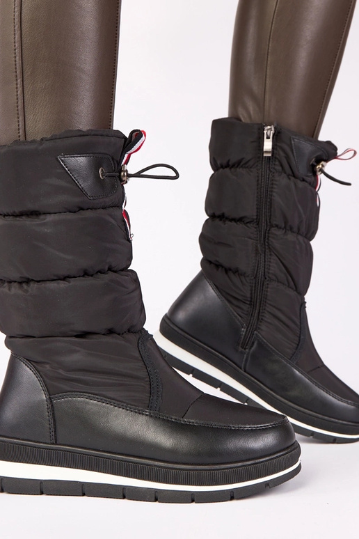 Musta lumesaapad madalal kontsaga...