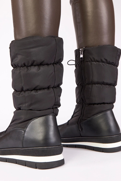 Musta lumesaapad madalal kontsaga...