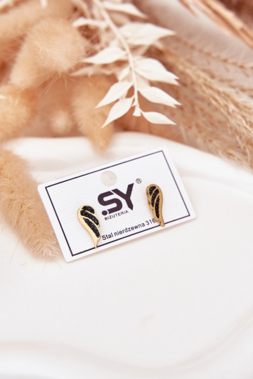 saapad koos stiilsete detailidegai Skrzydła roostevabast terasest