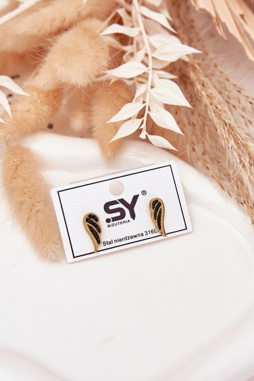 saapad koos stiilsete detailidegai Skrzydła roostevabast terasest