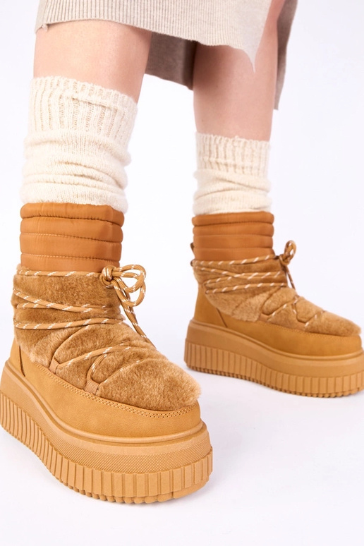 Pruunid lumesaapad platvormil...