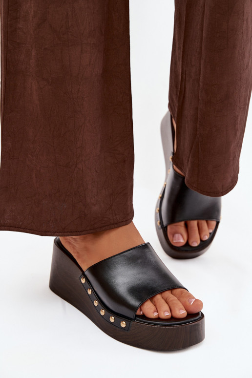 Naistelised sussid platvormiga kuldsete nupukestega mustas Arionne