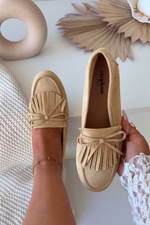 Naistelised mokasiinid kutidega kollases Janelisse