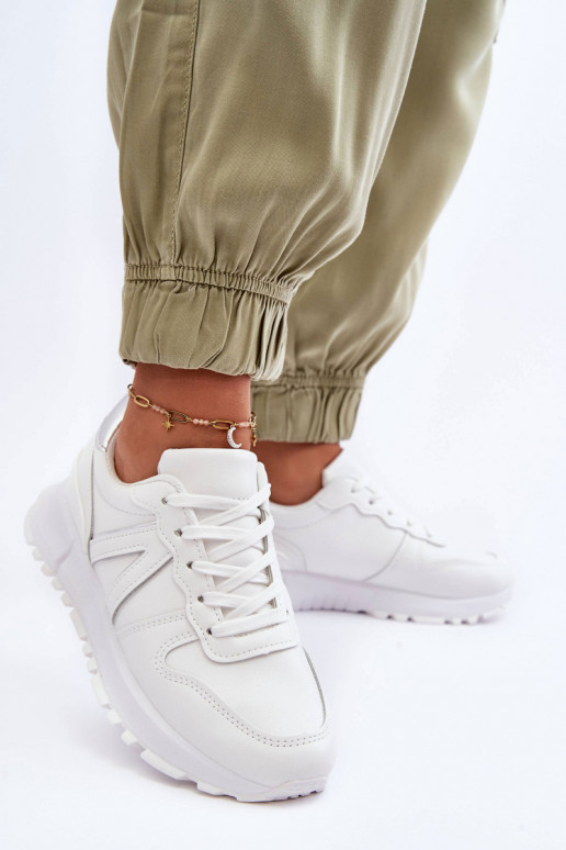 Pealhk Pealiste omad spordijalatsid valget värvi Kabama