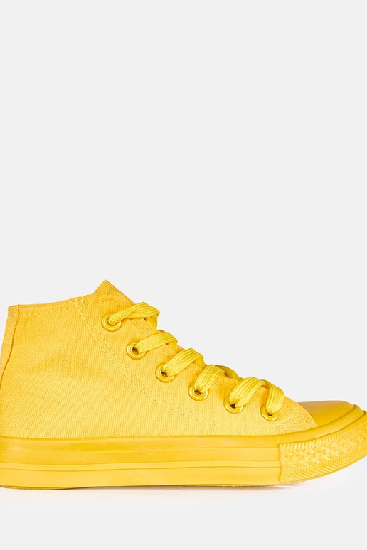 Kollased laste spordijalatsid üle...