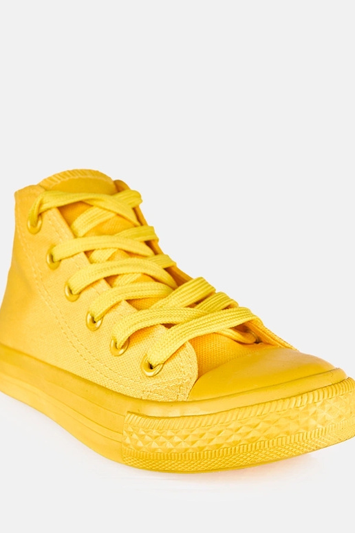 Kollased laste spordijalatsid üle...