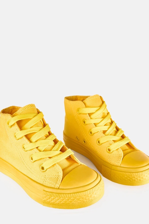 Kollased laste kõrged spordijalatsid...