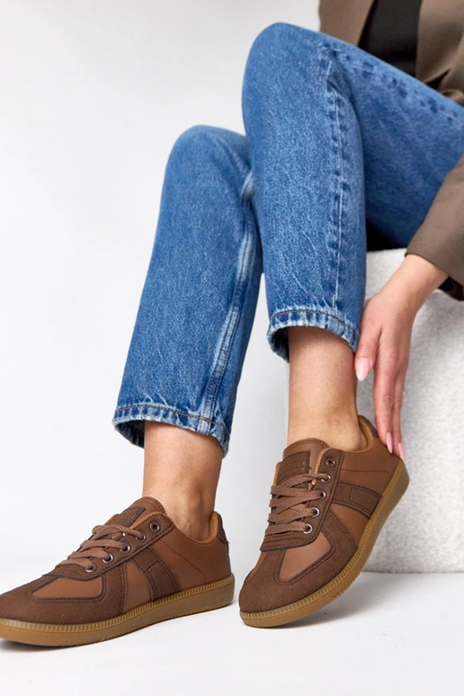 Brązowe sneakersy na platformie...