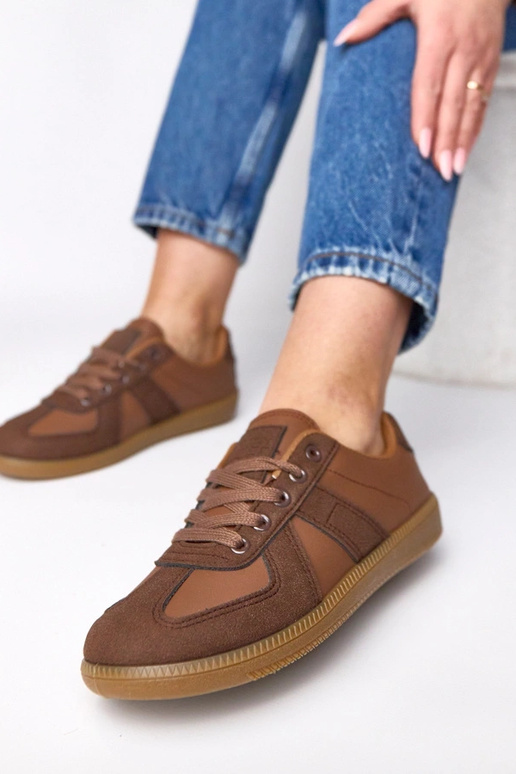 Brązowe sneakersy na platformie...