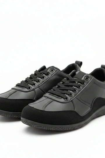 Mustad mehelikud sussid Leon 2