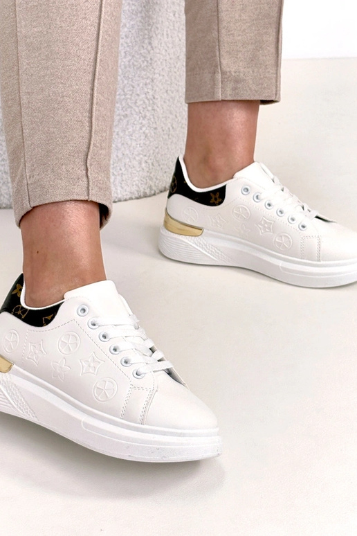 Valged spordijalatsid tihedusega Peyton