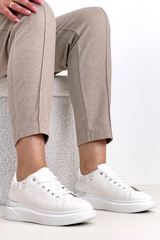 Valged spordijalatsid tihedusega Peyton