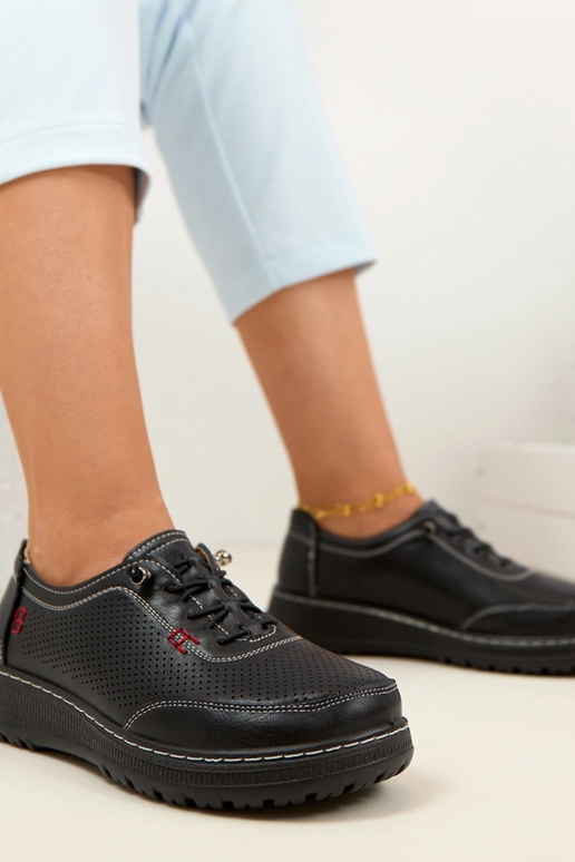 Mustad avatud pealsega poolsaapad...