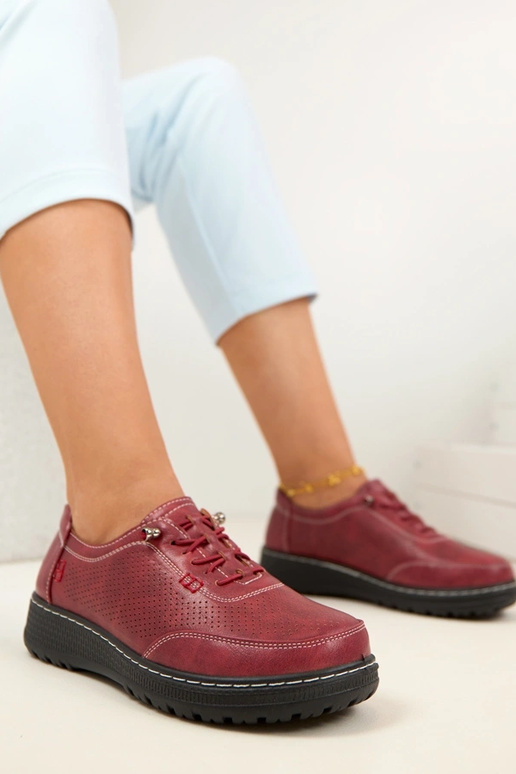 Punased avatud pealsega poolsaapad...