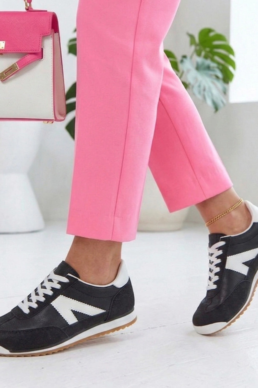 Mustad spordijalatsid valgete...