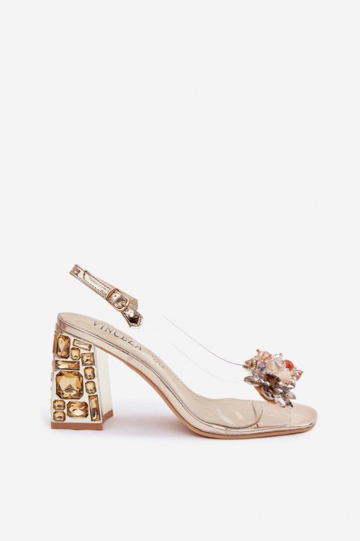 sandaalid Külgedelt läbipaistvad kõrge jämeda kontsaga kristallidega Vinceza 70121 Kuldset värvi