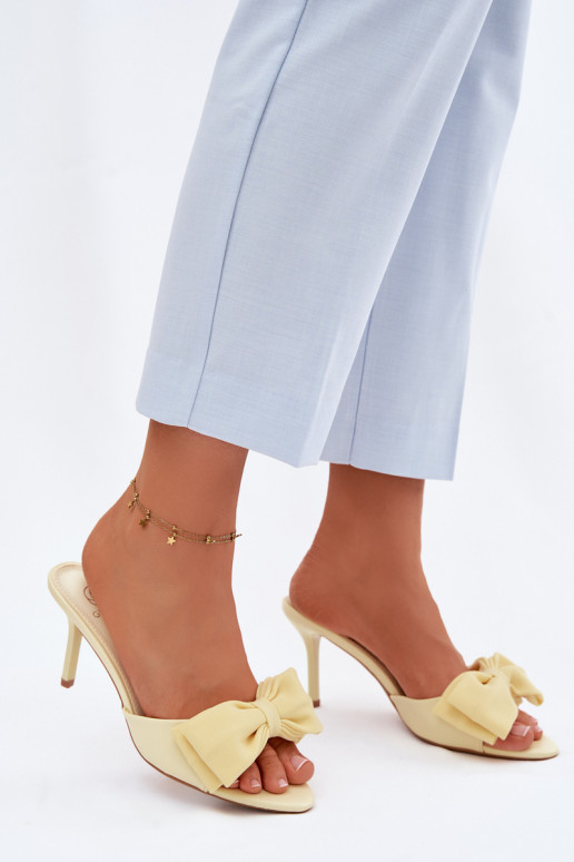 Naiste sussid õhukeste kontsade ja paeltega kollased Jelessa