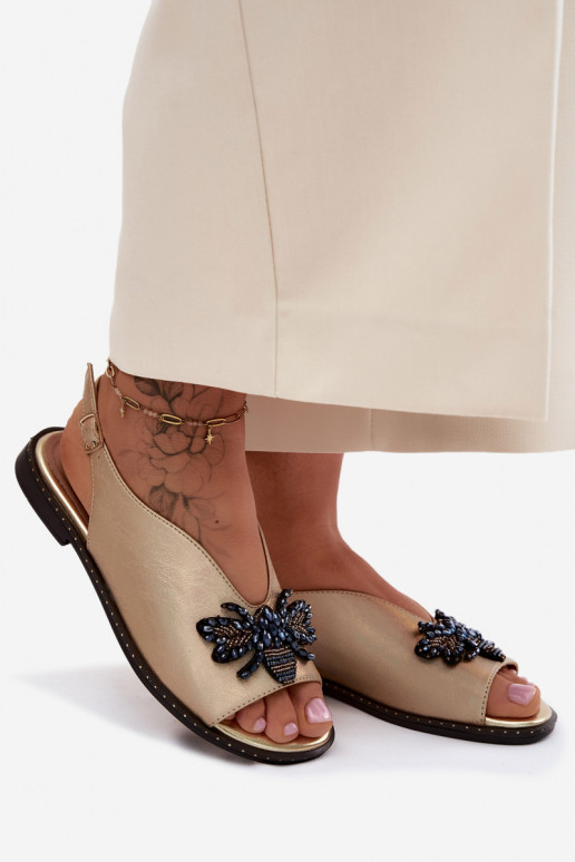 Läikivad Pealistesandaalid kaunistustega sileda tallaga Kuldset värvi Russona