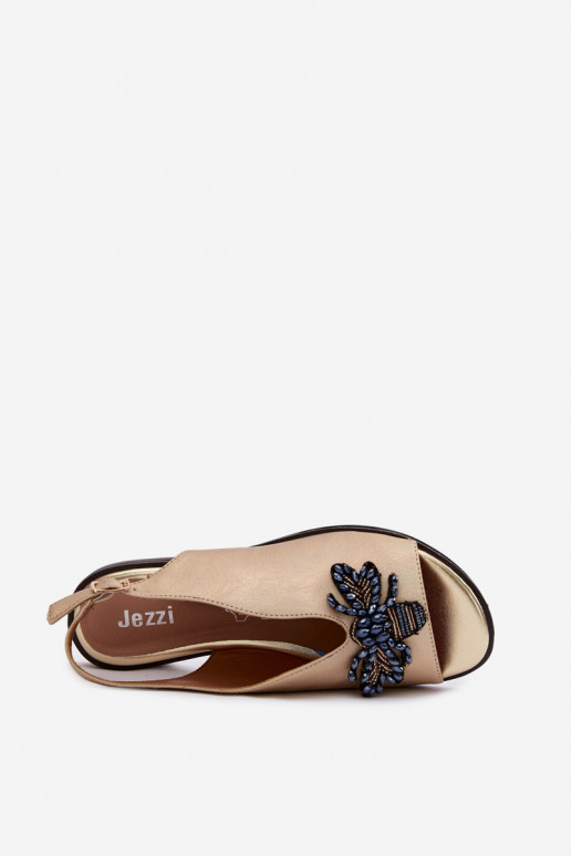 Läikivad Pealistesandaalid kaunistustega sileda tallaga Kuldset värvi Russona