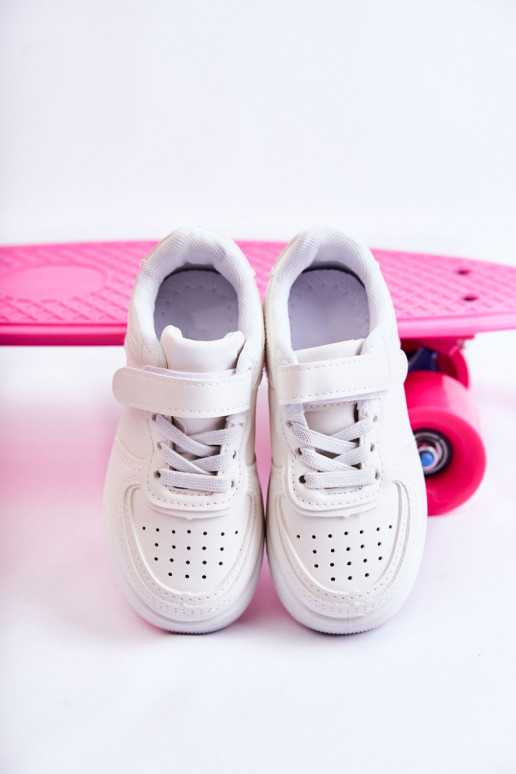 Laste jalanõud spordijalatsid krõpsudega kinnitatav valget värvi Elike Laste jalanõud spordijalatsid krõpsudega kinnitatav valget värvi Elike