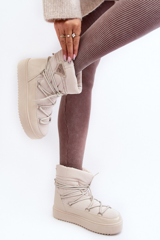 nööpidega lumesaapad platvormtalla ja stiilsete detailidega beeži värvi Fleure