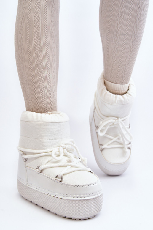 nööpidega lumesaapad saapad koos stiilsete detailidega valget värvi Toolsa nööpidega lumesaapad saapad koos stiilsete detailidega valget värvi Toolsa