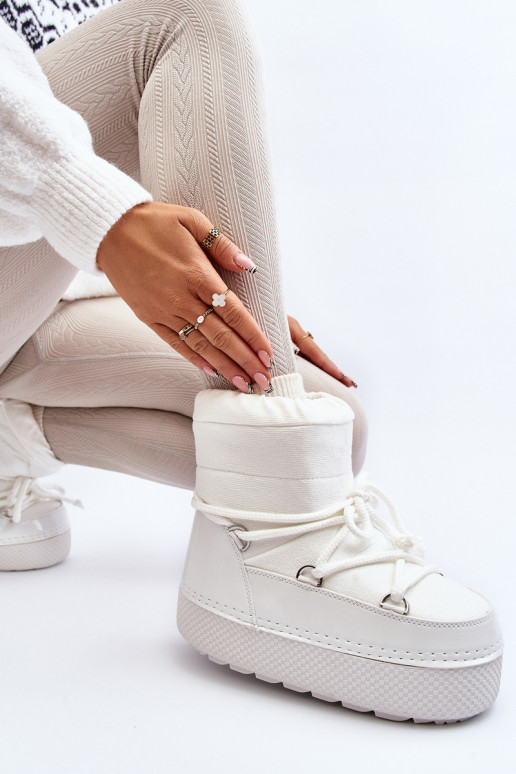 nööpidega lumesaapad saapad koos stiilsete detailidega valget värvi Toolsa nööpidega lumesaapad saapad koos stiilsete detailidega valget värvi Toolsa