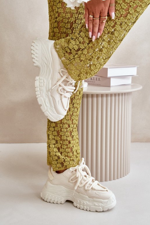 Sneakers tüüpi jalanõud Pealiste omad Sellel onssiivsel tallal Elevandiluu värvi Nevela Sneakers tüüpi jalanõud Pealiste omad Sellel onssiivsel tallal Elevandiluu värvi Nevela