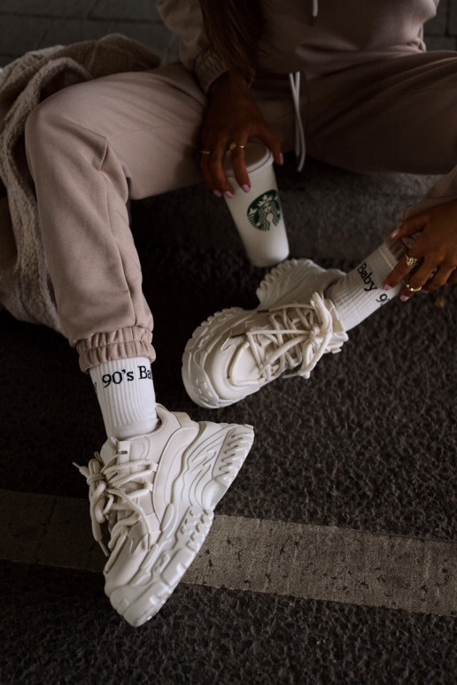 Sneakers tüüpi jalanõud Pealiste omad Sellel onssiivsel tallal Elevandiluu värvi Nevela Sneakers tüüpi jalanõud Pealiste omad Sellel onssiivsel tallal Elevandiluu värvi Nevela