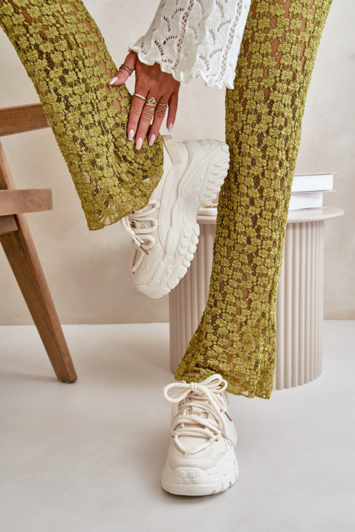 Sneakers tüüpi jalanõud Pealiste omad Sellel onssiivsel tallal Elevandiluu värvi Nevela Sneakers tüüpi jalanõud Pealiste omad Sellel onssiivsel tallal Elevandiluu värvi Nevela