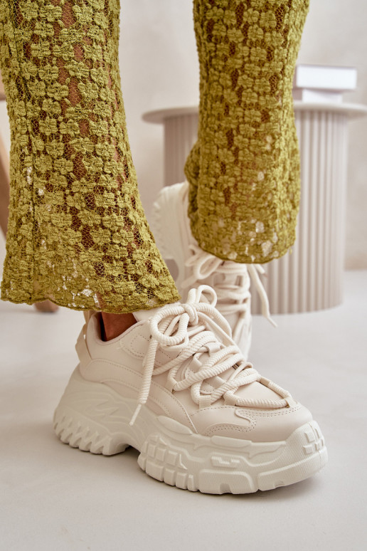 Sneakers tüüpi jalanõud Pealiste omad Sellel onssiivsel tallal Elevandiluu värvi Nevela Sneakers tüüpi jalanõud Pealiste omad Sellel onssiivsel tallal Elevandiluu värvi Nevela