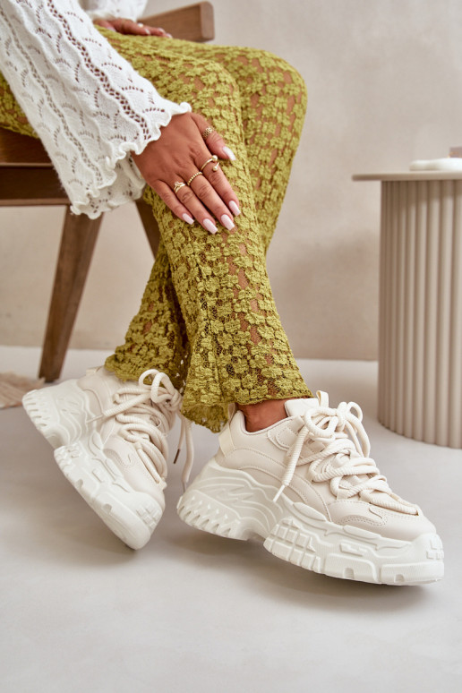 Sneakers tüüpi jalanõud Pealiste omad Sellel onssiivsel tallal Elevandiluu värvi Nevela Sneakers tüüpi jalanõud Pealiste omad Sellel onssiivsel tallal Elevandiluu värvi Nevela