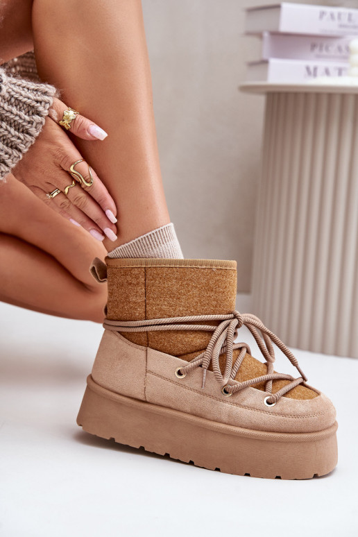 nööpidega lumesaapad saapad koos stiilsete detailidega platvormiga pruunid värvi Sellel onvora